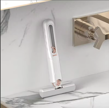 LIMPIADOR PORTATIL ULTRA ABSORBENTE PARA TODAS LAS SUPERFICIES